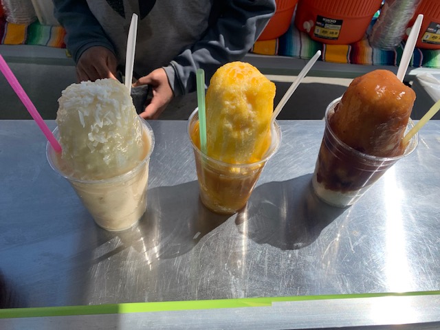 Three shaved ice cups lineup